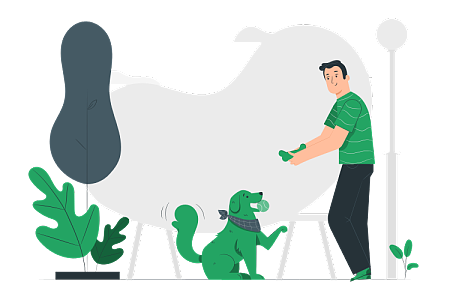 馴獸師在小狗完成指令后給它骨頭作為獎(jiǎng)勵(lì)