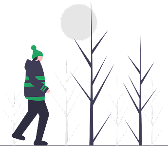 男青年穿着羽绒服在雪地里散步